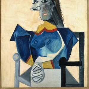 Femme assise au Chapeau en forme de poisson Picasso